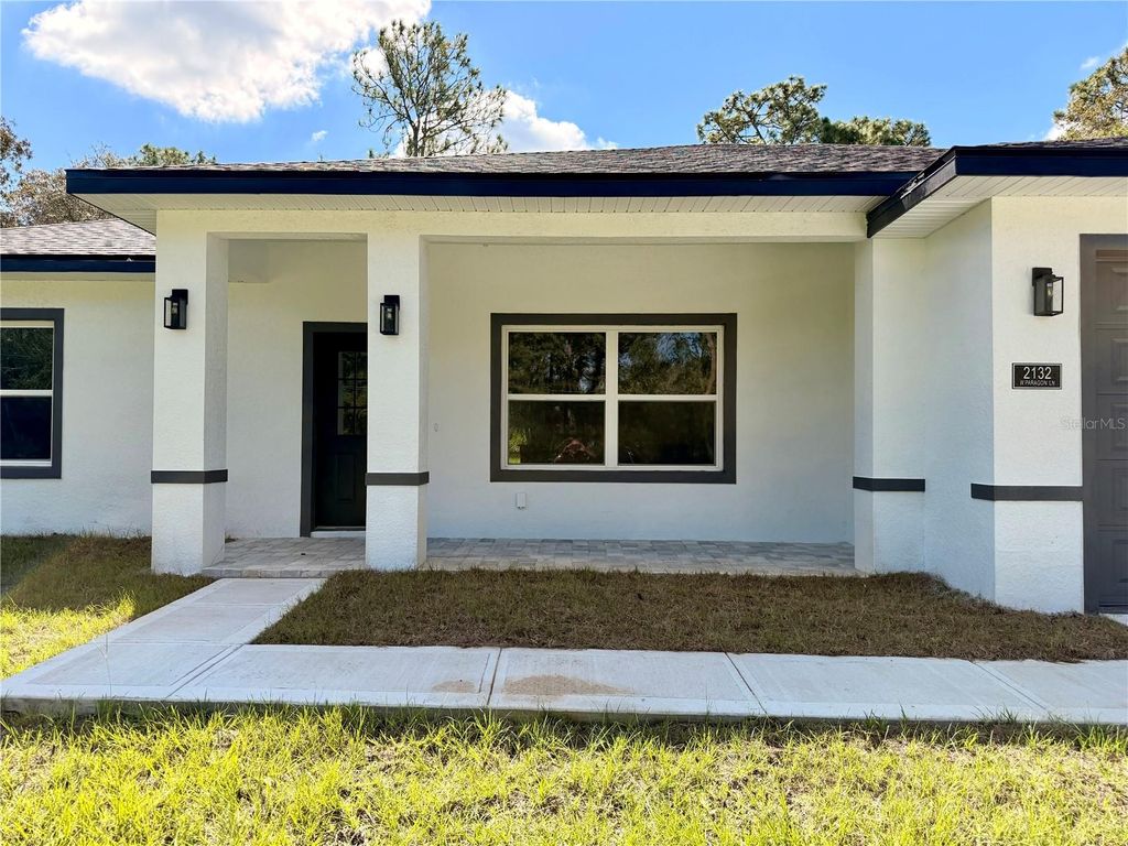 Photo of 2132 W Paragon Lane, Citrus Springs, FL 34434 (MLS # O6353808)