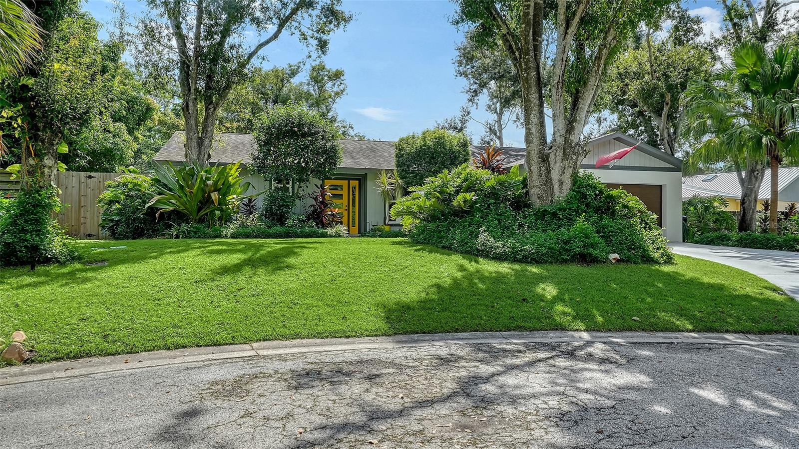 Welcome to this beautifully updated 3-bedroom, 2-bath home tucked away on a quiet canopy cul-de-sac, offering privacy while still being centrally located near all that Sarasota has to offer, including world-renowned Siesta Key Beach. Thoughtfully renovated inside and out, this home blends comfort, style, and peace of mind with an impressive list of upgrades. A lushly landscaped entry leads into a bright, open living space filled with natural light from new PGT impact hurricane windows installed in 2019. At the heart of the home is the renovated kitchen, featuring a Sub-Zero refrigerator/freezer, an induction cooktop with convection and air-fry oven, dishwasher, generous cabinetry, upgraded finishes, and a cozy built-in banquette perfect for casual in-kitchen dining. The split plan offers a spacious primary suite retreat, while two additional bedrooms provide flexibility for guests, family, or a home office. Both bathrooms were completely remodeled in 2019 with new tile, fixtures, lighting, cabinets, glass doors, and modern finishes. In 2022, the main living areas received Coretec ProPlus luxury vinyl plank flooring with new wood baseboards, creating a sleek and cohesive look throughout the home. Step outside to your own tropical oasis with a screened lanai, a sparkling pool, and spa with a Pebblecrete surface, and a Hayward pool heater with remote automation installed in 2020. The backyard is framed by a new wood privacy fence with dual gates, enhanced by a professionally designed and installed automated landscape lighting system that highlights the lush gardens both day and night. The exterior has been further strengthened with hurricane-rated exterior doors added in 2021 and a new hurricane-rated garage door with belt-driven opener and digital keypad in 2023. This home has been consistently maintained and upgraded for both beauty and function. A new roof was installed in 2016, while the HVAC system was replaced in 2014 and has been under a biannual service contract since 2019. A Rheem hybrid electric water heater with WiFi capability was added in 2023, and the property also includes a Culligan water softener and osmosis drinking water system installed in 2020. Additional features include washer and dryer purchased in 2018, a four-zone WiFi-enabled irrigation system, and termite stations with continuous treatment under contract since 2018. With a spacious two-car garage for vehicles, storage, or hobbies, and a backyard oasis designed for relaxation and entertaining, this home offers comfort inside and out. Violet Avenue itself is a quiet, well-established street with only a handful of single-family homes with canopy trees adding to the curb appeal. The location is unmatched—close to top-rated schools, shopping, dining, and parks, while Downtown Sarasota, University Town Center, St. Armands Circle, and the Gulf beaches of Siesta and Lido Key are only minutes away. This home delivers the perfect blend of lifestyle, thoughtful upgrades, and convenience in one of Sarasota’s most desirable settings. Schedule your private showing today.