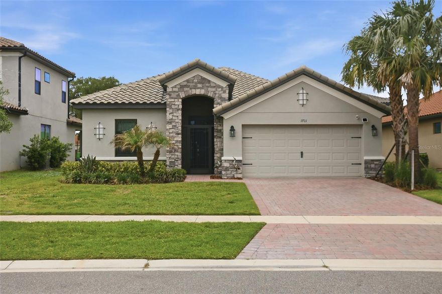 If you have been waiting for a newer home in Bellalago, this is it. Built just 3 years ago, this St. Thomas model offers 3 bedrooms plus a den, a massive screened lanai, and a layout designed for comfortable everyday living in a 24 hour guard gated community.

From the moment you arrive, the brick paver driveway and tile roof create strong curb appeal. Inside, the home feels open, clean, and move in ready with wood look tile throughout the main living areas, creating a seamless and cohesive look buyers love.

The kitchen is designed for both daily living and entertaining with quartz countertops, upgraded appliances, and washer and dryer already in place.

The primary suite offers a relaxing retreat with a spacious bathroom featuring a large garden tub, separate shower, and room to unwind at the end of the day.

Step outside and this is where the home separates itself. The massive screened lanai with brick pavers feels like a true outdoor living space with room for dining, lounging, and entertaining. Beyond the lanai, the backyard is already landscaped, giving you a more finished and inviting outdoor setting from day one.

Living in Bellalago means your lifestyle extends far beyond your front door. Residents enjoy two amenity centers with resort style pools, waterslides, splash areas, fitness centers, and a full calendar of activities. You also have tennis, basketball, pickleball, dog parks, playgrounds, and miles of walking trails.

Set along the shores of Lake Tohopekaliga, you have access to a private boat ramp, fishing pier, and the kind of lake life that is hard to find. There is even a waterfront restaurant right in the community.

Just outside the gates you will find Publix, Walgreens, dining, and everyday conveniences, with additional shopping, Valencia College, Disney World, and Disney Springs all within easy reach.

If you are looking for a newer home that feels complete, inside and out, in a community buyers love, this one is worth a closer look.