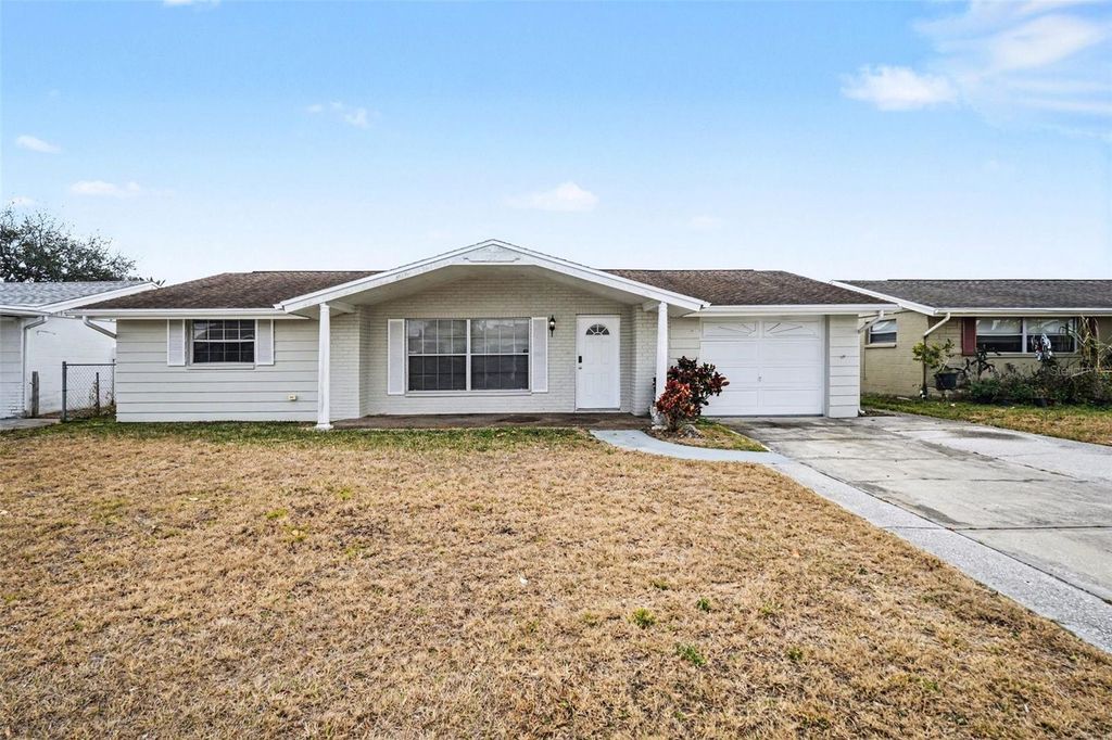 Photo of 7224 Ingleside Drive, Port Richey, FL 34668 (MLS # O6381411)