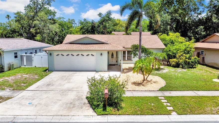 Charming 4-Bedroom Pool Home in the Heart of Seminole. Nestled just minutes from the beaches, this 4-bedroom, 2-bath home with a 2-car garage and a screened-in pool offers comfort, privacy, and move-in-ready peace of mind. In preparation for sale, the owners have completed a host of recent upgrades, including a new shingle roof, a new electric water heater, fresh exterior paint, pool cage painted and rescreened, and new vinyl fencing, and it has vinyl windoes. The open floor plan is thoughtfully designed with a split-bedroom layout: the primary suite sits privately on one side of the home, while the remaining three bedrooms are tucked away on the other. The spacious primary bedroom features a large walk-in closet and a private bath with an oversized shower. Among the additional bedrooms, the fourth offers standout versatility—a built-in Murphy bed makes it an effortless guest room, home office, or bonus space as your needs change. Everyday living is just as convenient. The indoor laundry room lets you skip the hot garage and do laundry in cool, air-conditioned comfort. Outdoors, the fully fenced yard is ideal for pets, the covered rear porch is perfect for dining poolside, and the screen enclosure keeps the pool clear of leaves year-round. This is Seminole living at its best— comfortable, low-maintenance, and close to it all. The location is great only a few minutes from the beach, close access to the Pinellas Trail, and the neighborhood has it's own entrance to the Walsingham Park a few houses away.