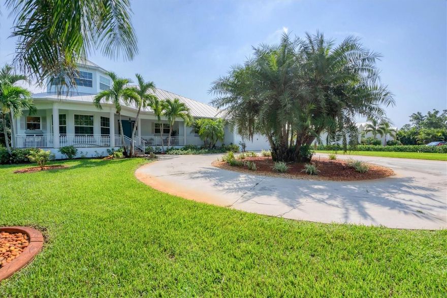 Imagine your own tropical oasis just minutes by boat to the Intracoastal Waterway and the stunning Gulf of Mexico. This exceptional waterfront home, with Pool Cabana/ In-Law Suite situated on an oversized lot of .64 acres, is a true paradise, surrounded by mature landscaping and designed for all your boating needs. This home has sustained very minimal damage in last few hurricanes and took on no water in Helene or Milton. 
* Key West Style Home
* Minutes to Boca Grande Beaches and World Class Tarpon Fishing
* 2 Boat Lifts (10K and 15K with Roof Canopies)
* New 140' Seawall 
* Metal Roof
* Insulation Package
* PGT Impact Windows/Sliders and Impact Garage Door
* Multi Generational Living Space with Full Kitchen and Bath
* Outdoor Kitchen (Fire Magic)
* Custom Pool/Spa with Heater
* White Oak Flooring
* Coral Wrapped Fireplace As you approach the front door via the inviting circular driveway, you'll be captivated by the charming cupola, elegant metal roof, and welcoming front porch that embody the essence of coastal living. Step inside to discover a spacious living area that seamlessly blends luxury and comfort, featuring exquisite white oak flooring, soaring high ceilings, crown molding, and three-panel impact sliding doors that fill the space with natural light. A stunning fireplace encased in coral adds warmth and character to this inviting gathering space. To the left, the den area provides a perfect retreat, while the stairway leading to the cupola offers a unique vantage point to take in the breathtaking views. The heart of this home is undoubtedly the chef's kitchen, showcasing level 5 granite countertops, under-cabinet lighting, abundant counter and cabinet space, a convenient bar top, and a cozy breakfast nook overlooking the serene lanai and sparkling pool area. Step outside to your jaw-dropping outdoor oasis, where you’ll want to spend most of your time. The recently renovated saltwater pool and spa are the centerpiece of this luxurious retreat, complemented by a fully equipped outdoor kitchen, a half bath, and a charming pool cabana that doubles as an in-law suite. The cabana features a kitchenette, a full bath, and three additional panels of impact PGT sliders, ensuring comfort for guests and family alike.
The waterfront features are truly exceptional, providing the ultimate setup for water enthusiasts. Your private dock area boasts two covered boat lifts offering ample space for all your water-based toys. Additionally, a pre-plumbed spot for an ice maker conveniently located near the main house enhances your outdoor entertaining experience. This setup is a rare find and is sure to impress even the most discerning buyers.
Inside, the expansive master suite offers direct access to the lanai and pool area, creating a perfect retreat. The roman walk-in shower, soaker tub and generous storage space make this sanctuary both luxurious and practical. The guest rooms, situated on the opposite side of the home, provide privacy for both you and your visitors.
As an added bonus, HOA membership includes dockage and private beach access to Knight Island, providing a perfect escape just a stone’s throw away.
This coastal gem seamlessly combines sophistication, comfort, and exceptional outdoor living, making it the perfect place to call home. Don’t miss the opportunity to experience the ultimate in Florida waterfront living—schedule your private tour today!