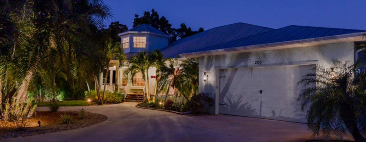 Imagine your own tropical oasis just minutes by boat to the Intracoastal Waterway and the stunning Gulf of Mexico. This exceptional waterfront home, with Pool Cabana/ In-Law Suite situated on an oversized lot of .64 acres, is a true paradise, surrounded by mature landscaping and designed for all your boating needs. This home has sustained very minimal damage in last few hurricanes and took on no water in Helene or Milton. <br><br>
* Key West Style Home
* Minutes to Boca Grande Beaches and World Class Tarpon Fishing
* 2 Boat Lifts (10K and 15K with Roof Canopies)
* New 140' Seawall
* Metal Roof
* Insulation Package
* PGT Impact Windows/Sliders and Impact Garage Door
* Multi Generational Living Space with Full Kitchen and Bath
* Outdoor Kitchen (Fire Magic)
* Custom Pool/Spa with Heater
* White Oak Flooring
* Coral Wrapped Fireplace<br><br> As you approach the front door via the inviting circular driveway, you'll be captivated by the charming cupola, elegant metal roof, and welcoming front porch that embody the essence of coastal living. Step inside to discover a spacious living area that seamlessly blends luxury and comfort, featuring exquisite white oak flooring, soaring high ceilings, crown molding, and three-panel impact sliding doors that fill the space with natural light. A stunning fireplace encased in coral adds warmth and character to this inviting gathering space.<br><br>To the left, the den area provides a perfect retreat, while the stairway leading to the cupola offers a unique vantage point to take in the breathtaking views. The heart of this home is undoubtedly the chef's kitchen, showcasing level 5 granite countertops, under-cabinet lighting, abundant counter and cabinet space, a convenient bar top, and a cozy breakfast nook overlooking the serene lanai and sparkling pool area.<br><br>Step outside to your jaw-dropping outdoor oasis, where you’ll want to spend most of your time. The recently renovated saltwater pool and spa are the centerpiece of this luxurious retreat, complemented by a fully equipped outdoor kitchen, a half bath, and a charming pool cabana that doubles as an in-law suite. The cabana features a kitchenette, a full bath, and three additional panels of impact PGT sliders, ensuring comfort for guests and family alike.<br><br>
The waterfront features are truly exceptional, providing the ultimate setup for water enthusiasts. Your private dock area boasts two covered boat lifts offering ample space for all your water-based toys. Additionally, a pre-plumbed spot for an ice maker conveniently located near the main house enhances your outdoor entertaining experience. This setup is a rare find and is sure to impress even the most discerning buyers.<br><br>
Inside, the expansive master suite offers direct access to the lanai and pool area, creating a perfect retreat. The roman walk-in shower, soaker tub and generous storage space make this sanctuary both luxurious and practical. The guest rooms, situated on the opposite side of the home, provide privacy for both you and your visitors.<br><br>
As an added bonus, HOA membership includes dockage and private beach access to Knight Island, providing a perfect escape just a stone’s throw away.<br><br>
This coastal gem seamlessly combines sophistication, comfort, and exceptional outdoor living, making it the perfect place to call home. Don’t miss the opportunity to experience the ultimate in Florida waterfront living—schedule your private tour today!<br><br>