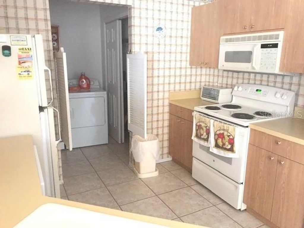 Photo of 748 Angelita Avenue, Lady Lake, FL 32159 (MLS # OM705804)