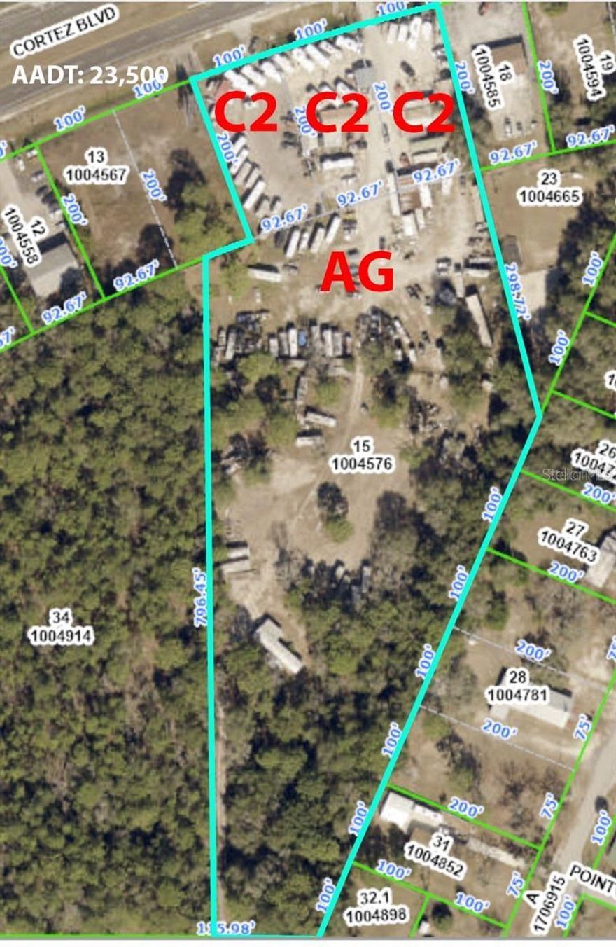 ALMOST 7 ACRES on right on CORTEZ BLVD (Hwy 50)...just east of the Suncoast Parkway (Toll Road 589). GREAT LOCATION!! Annual Average Daily Traffic Count: 23,500 AADT. PAUL CLARK SHEDS LOCATION. The property is made up of 4 parcels. There are 3 parcels on Cortez that are zoned C2 (each lot is 100x200...so 300 feet of frontage on Hwy 50) and a large parcel adjoining the back of it that is zoned AG is 5.6 acres. This makes up the almost 7 acres. EASY ACCESS in the eastbound lanes and a dedicated turning lane for the west bound traffic directly into the business!! Just west of Ft. Dade Rd, across from the big 7-11 gas station. Lots of room for your business. Only physically attached buildings convey.Everything on the property is available for sale separately. Growing area with great road frontage and visibility.