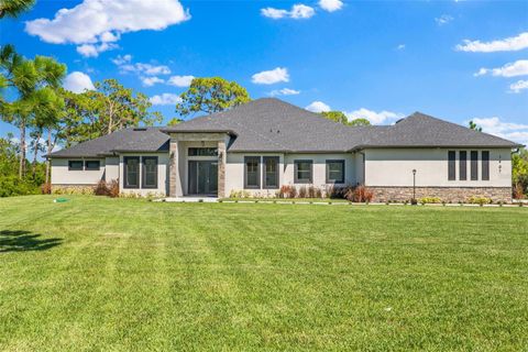 Photo of 1907 Positano Drive, Malabar, FL 32950 (MLS # S5134403)