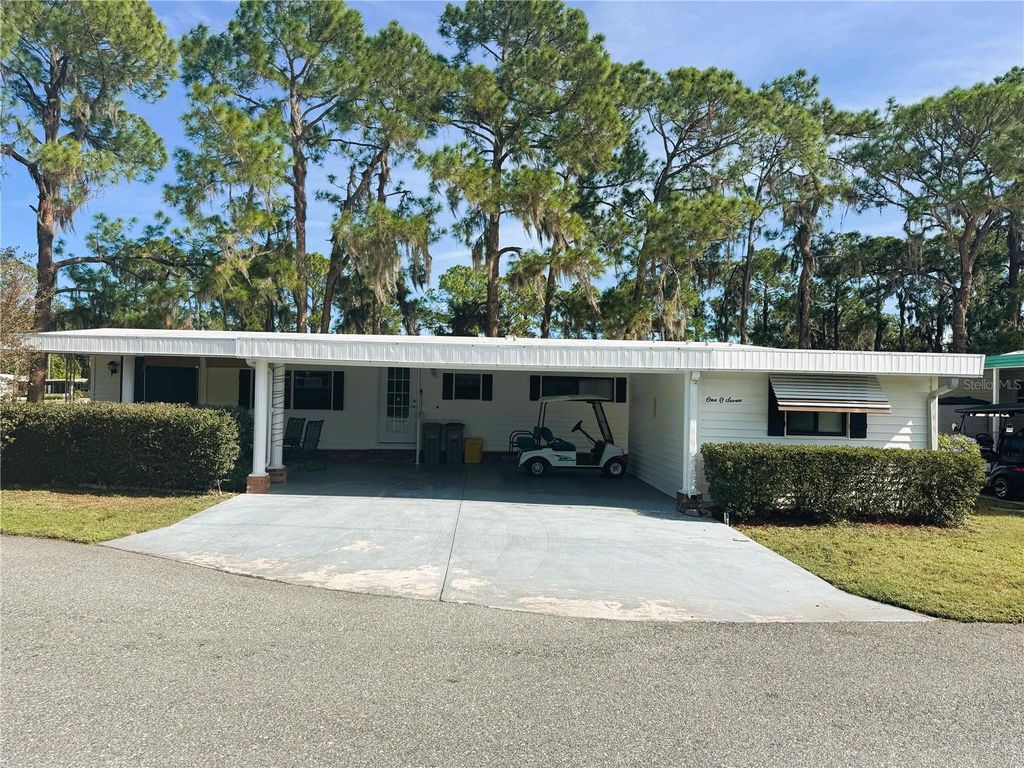 Photo of 107 Valencia Cove, Leesburg, FL 34748 (MLS # R4909961)