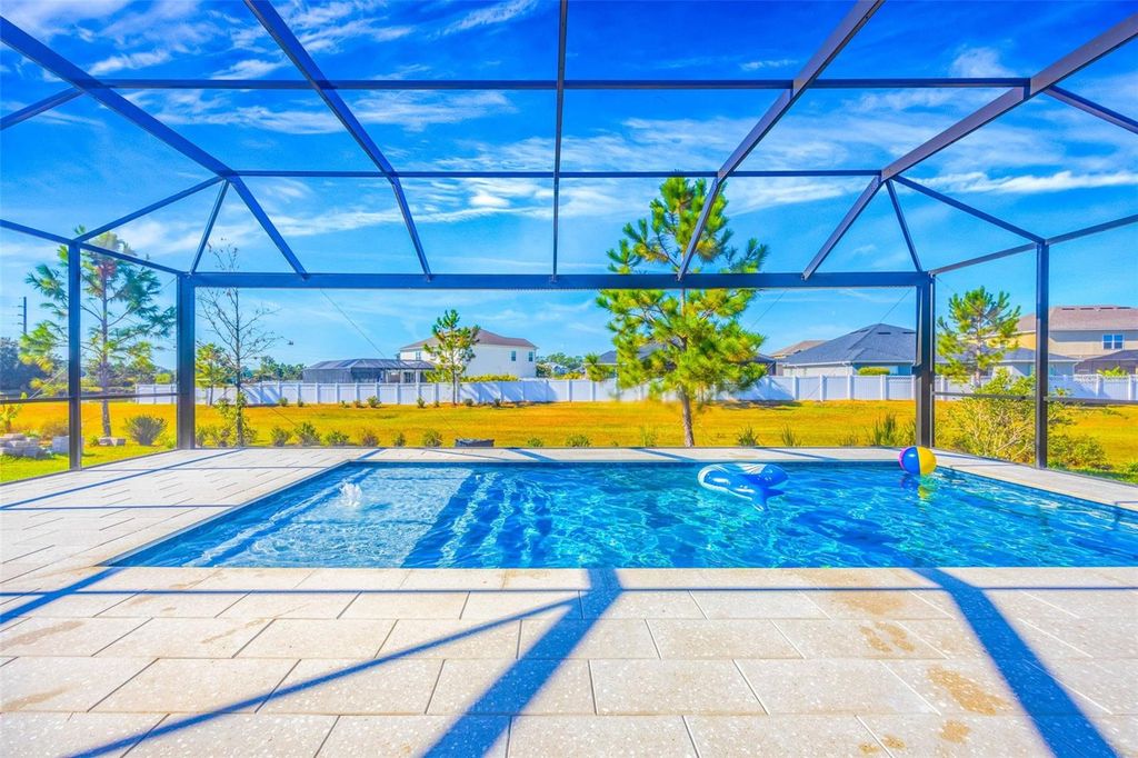 Photo of 33995 Astoria Circle, Wesley Chapel, FL 33545 (MLS # TB8452869)