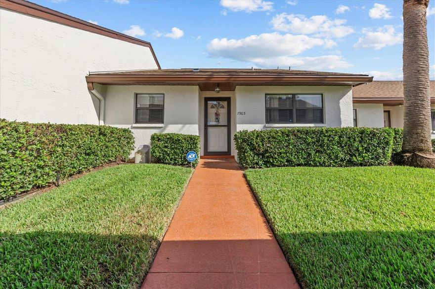 NO REAR NEIGHBORS!  Welcome to this beautifully maintained single-story villa located in the sought-after 55+ gated neighborhood of The Orchards of Radcliffe. This spacious home features two generously sized bedrooms, each with its own walk-in closet, and two full bathrooms for comfort and convenience.

The enclosed Florida Room—complete with central heat and air—adds extra year-round living space. Additional features include covered parking and an attached storage shed for added functionality.

This low-maintenance lifestyle comes with a comprehensive monthly fee covering exterior maintenance (including painting and roof care), insurance, cable and internet, water, sewer, trash, pest control, and access to the community’s clubhouse, pool, and spa.

Inside, the home offers an updated laundry room with washer and dryer and storage, a refreshed kitchen with a modern sink, faucet, and refrigerator, stove, microwave and new dishwasher. You’ll also find a water softener system, and updated bathroom sinks. The interior has been freshly painted and includes new kitchen flooring.

Energy-efficient electric roll-down hurricane shutters provide peace of mind, and an owned security system paid by the HOA that adds an extra layer of protection. The A/C system has a new compressor, so those big-ticket items are up to date.

Enjoy your mornings or evenings on the newly updated back patio, surrounded by lush, Florida-friendly landscaping. This home is ideally located near beaches, shopping centers, great dining spots, and has easy access to the Sun coast Parkway and major highways.  Near Downtown NEW Port Richey.