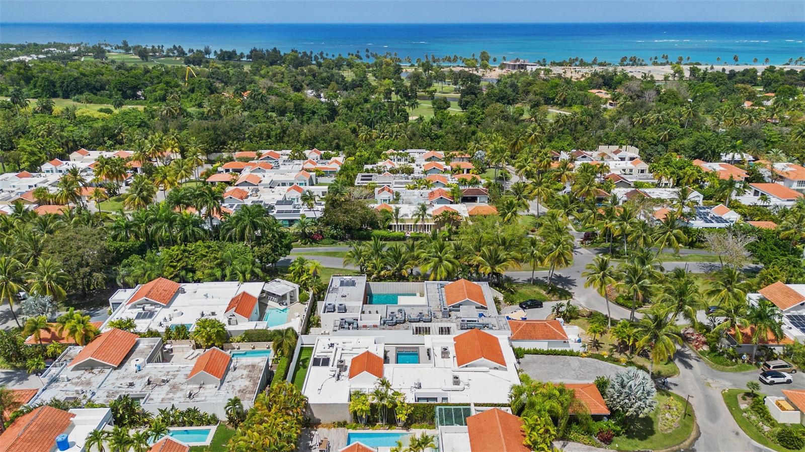 Enjoy living at the best coastal community of Dorado Beach East. This stunning property is situated on an elevated land plot of 948.4 square meters (.23 acres). The house has undergone a total renovation, including new plumbing and electrical wiring, Porcelanico tiles, doors and windows from Durabella, kitchen cabinets, closet organizers, and bathroom vanities from Design Hub Italy, Bertazzoni appliances, and quartz countertops. The well-distributed house features a bright open concept with 4 ensuite bedrooms offering views of the interior garden, a beautiful primary bedroom with a resort-style bathroom and ample walk-in closet, a living area, two family rooms, a dining area, a gourmet kitchen, a comfortable pantry, a covered terrace with a wet bar, a saltwater swimming pool, a full outdoor bathroom, a mudroom, 60 KW power generator, 300 gallons water cistern, a 2-car garage plus golf cart space, and a spacious driveway. The property boasts a total of 6,540 square feet which includes an approximate interior area 4,800 SqFt or 5,600 SqFt including the swimming pool area. house is sold completely furnished. The neighborhood offers amenities such as the Old Aqueduct Swimming Pool, Gym, The Bunker Playroom, Tennis courts, Livingstone park with playgrounds and swimming pools, the Rockefeller Trail and direct access to the beach. HOA $1,095 / Property Taxes $4,694.10 (approximate). Contact us for mare pictures and for a walkthrough video of the property.