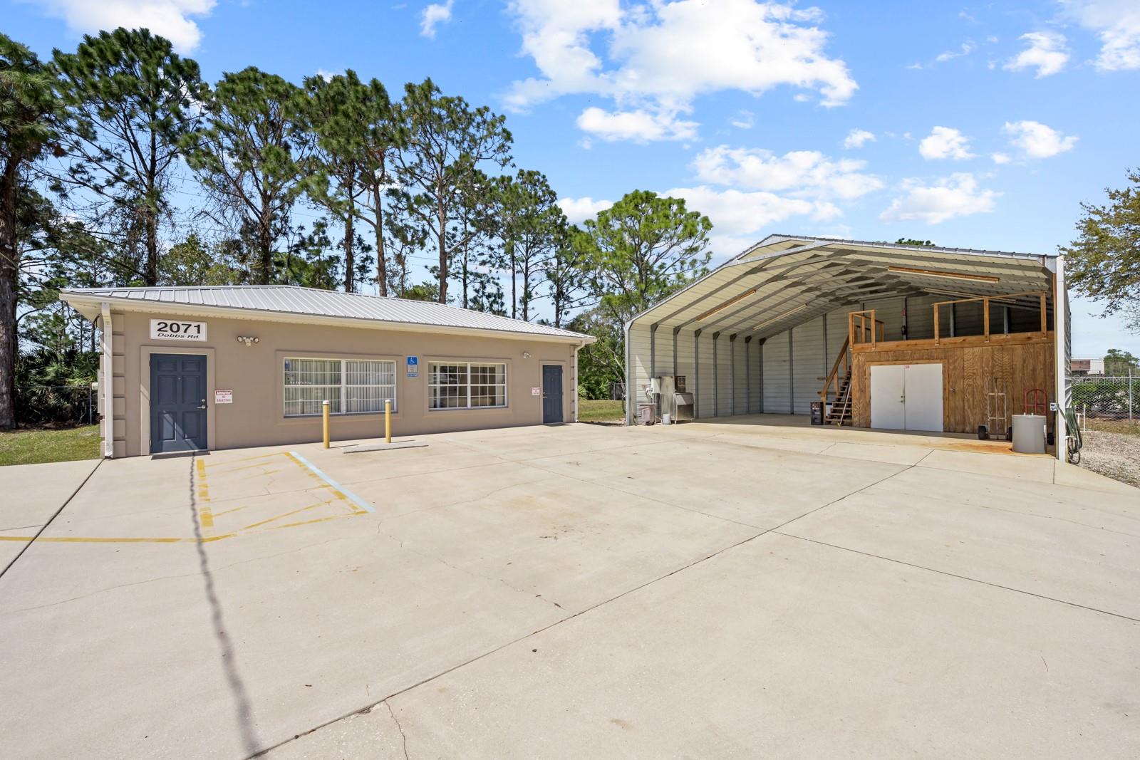 In St. Johns county the CI zoining district stands for Commercial- Intensive a classification in the county land development code that permits a wide range of uses beyond those allowed in lighter commerical zones.
What a great investment opportunity! With the commercial building features, including two offices, a full bathroom and half bath. The property has additional 1225 open storage space, it offers versatility for various business needs. Such as the fully fenced chain-link perimeter and gated entrance, add value and peace of mind. The presence of a small kitchen area and reception space enhances its functionality, and the ample 7 plus parking is definitely a plus for both employees and customer.