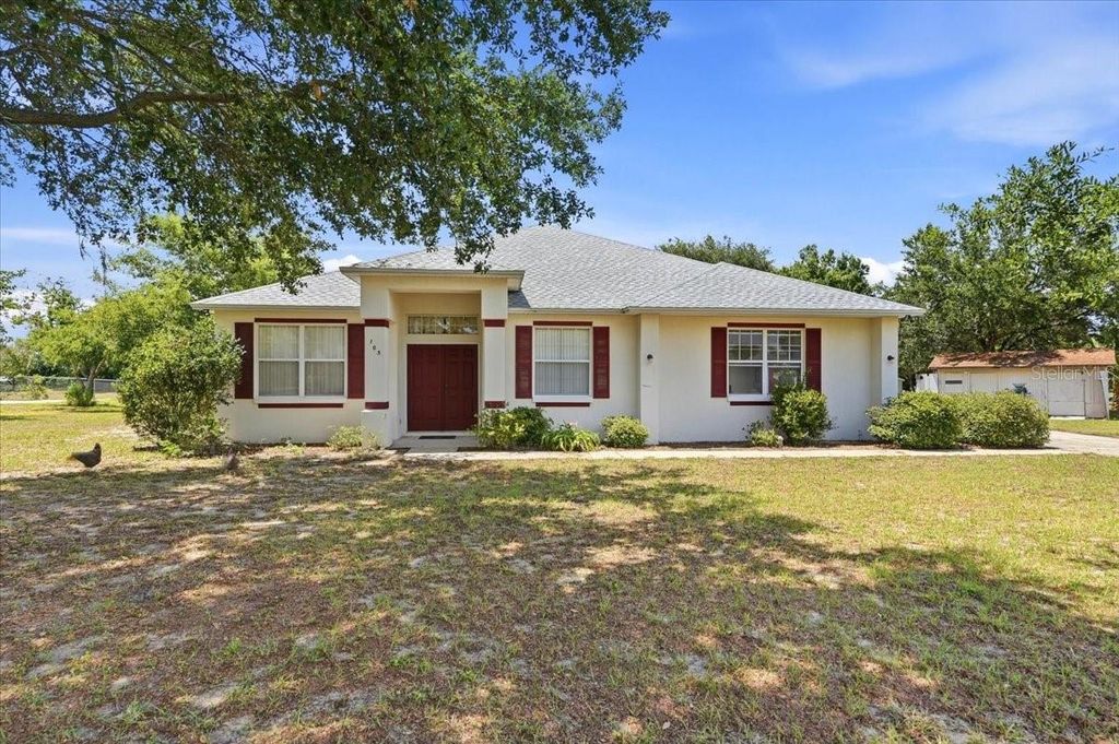 Photo of 103 N 1st Street, Eagle Lake, FL 33839 (MLS # L4962035)