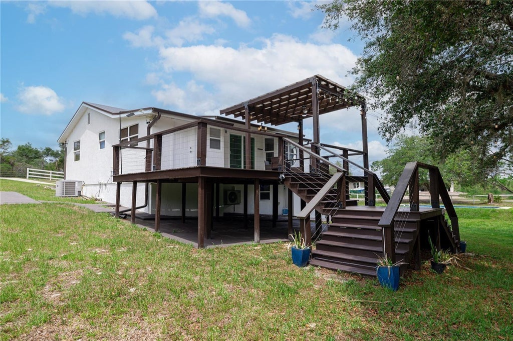 Photo of 2409 Lake Tiny Road, Deltona, FL 32738 (MLS # OM734496)