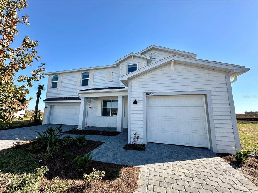 Under Construction. Welcome to your Florida dream home in the sought-after Parrish community of Rye Ranch! This brand-new, move-in-ready 5 bedroom, 4 bath residence features over 3,200 sq ft of well-designed living space and includes a 3-car garage. This expansive two-story home is the largest plan in the collection. On the first floor is a living room, formal dining room, open living space with a kitchen, bedroom suite and an attached lanai for outdoor activities. Upstairs hosts the owner’s suite, three secondary bedrooms and a cozy loft overlooking the Great Room. For those who call Rye Ranch® home, this community puts you close to countless shopping, dining and entertainment options. Embark on adventures like never before at amazing parks and recreational sites just nearby. This home sits on a generous homesite with professional landscaping and irrigation. Rye Ranch is a master-planned community featuring miles of trails, future parks, clubhouse, pools, fitness center, pickleball, tennis courts, and an on-site elementary school in development. HOA includes lawn care, irrigation, and community amenities. Why wait to build? This home is ready now and has it all—schedule your private showing today!   Photos are for illustrative purposes only.