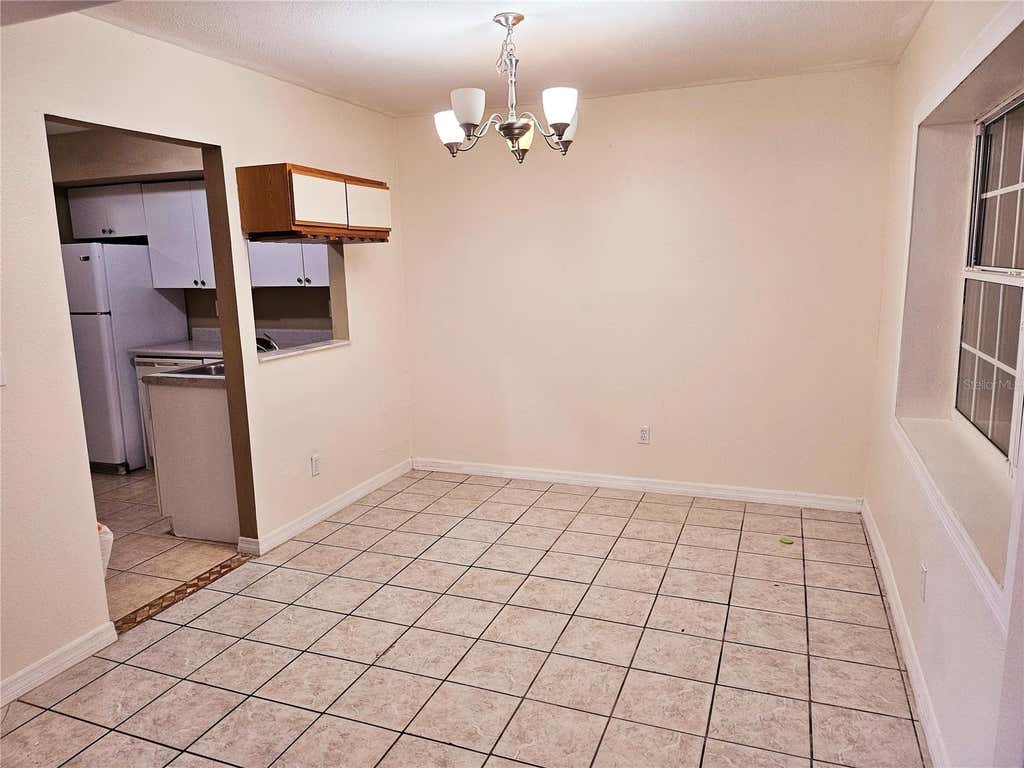 Photo of 6640 Pot O Gold Lane, Orlando, FL 32809 (MLS # O6420329)
