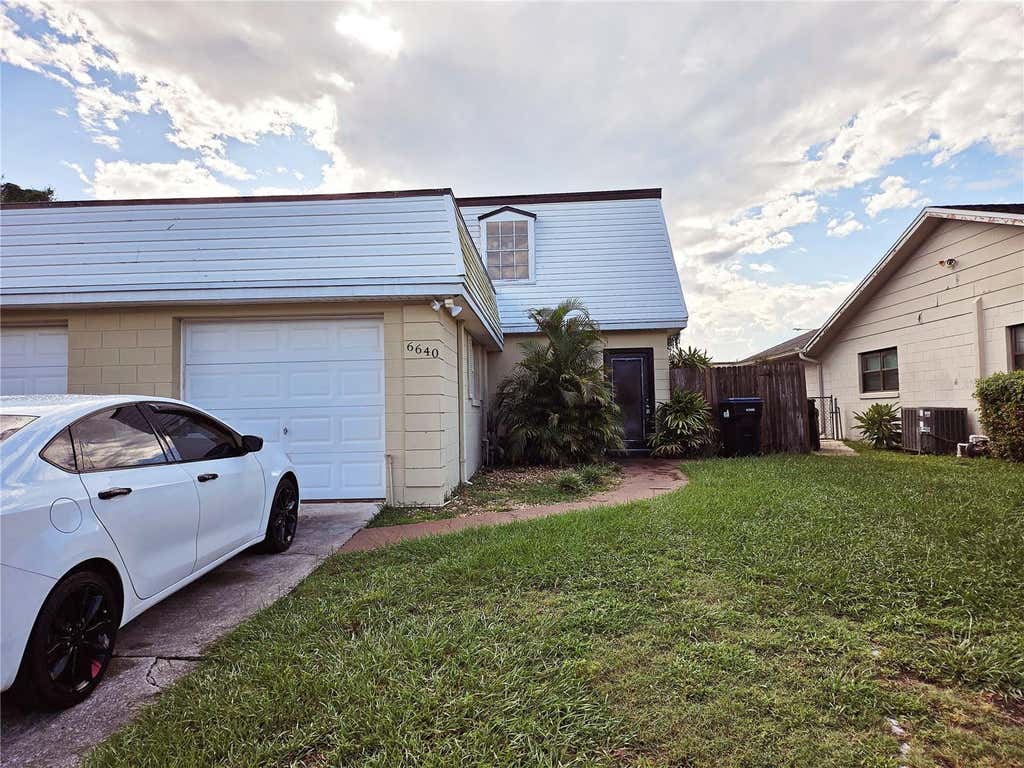 Photo of 6640 Pot O Gold Lane, Orlando, FL 32809 (MLS # O6420329)