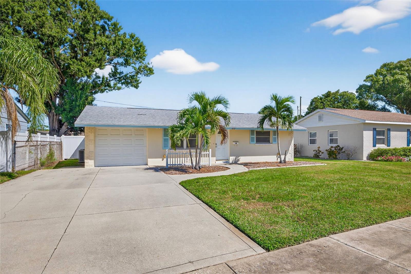 Welcome to this beautifully maintained 2-bedroom, 1-bath home offering a spacious bonus living area and a perfect blend of indoor comfort and outdoor enjoyment. Step inside to find an inviting living room filled with natural light and updated flooring throughout. The modern kitchen features stainless steel appliances, crisp white cabinetry, and ample counter space, ideal for both everyday meals and entertaining guests. The oversized bonus living area is a true highlight, offering flexibility for a second family room, game room, or home office with plenty of room to spread out. Outside, enjoy the ultimate Florida lifestyle with a covered bar area, fire pit seating, and a fully fenced backyard—perfect for gatherings with friends or quiet evenings under the stars. Located within walking distance to Noble Crust and just minutes from vibrant Downtown St. Petersburg. Don’t miss your chance to own this move-in-ready gem in a prime location! Measurements are appropriate and to be verified by buyer.