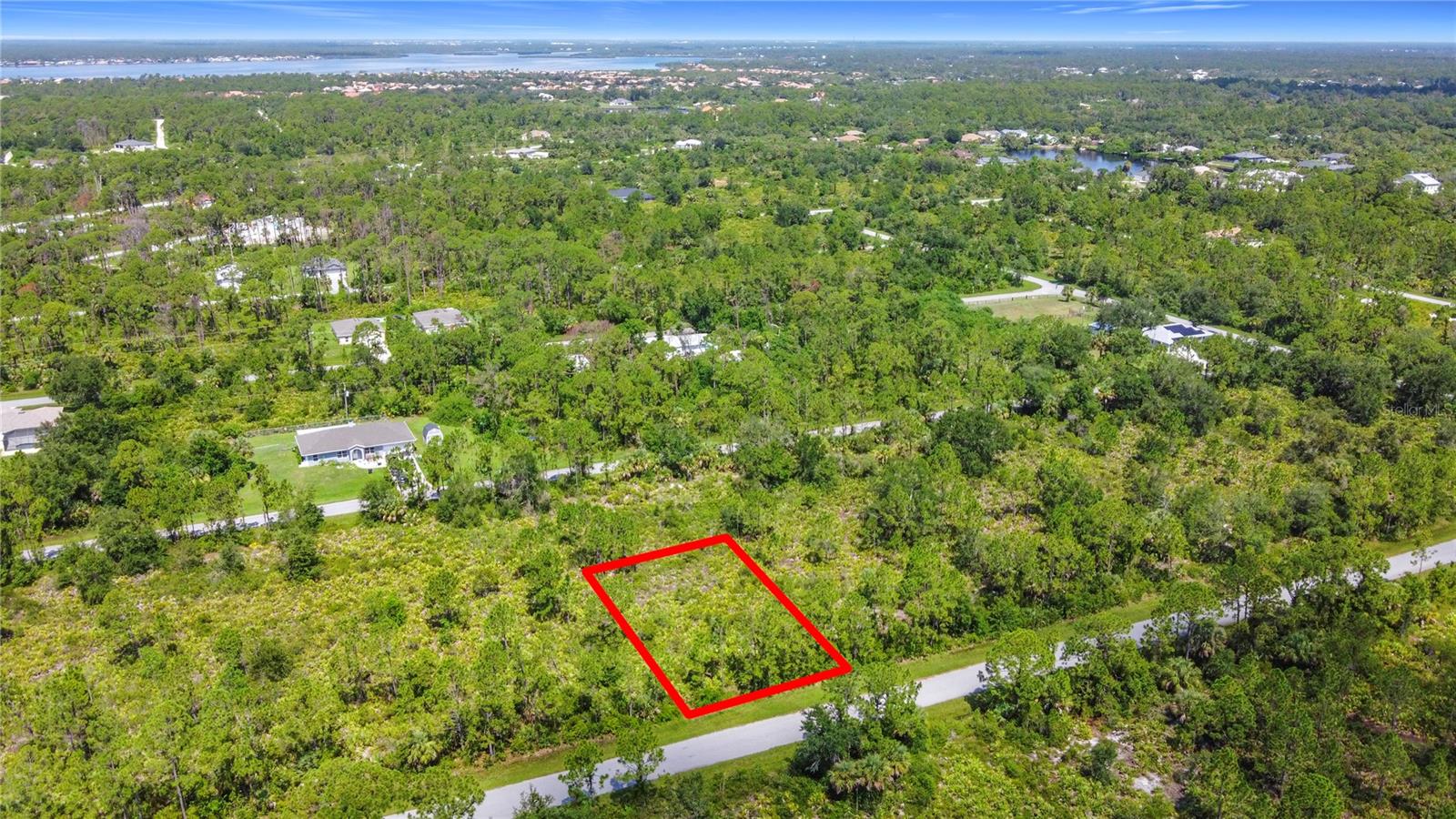 Residential-zoned lot, perfect for your next build or investment.