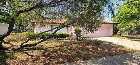 Photo of 8623 Stonehedge Way, Hudson, FL 34667 (MLS # TB8378989)