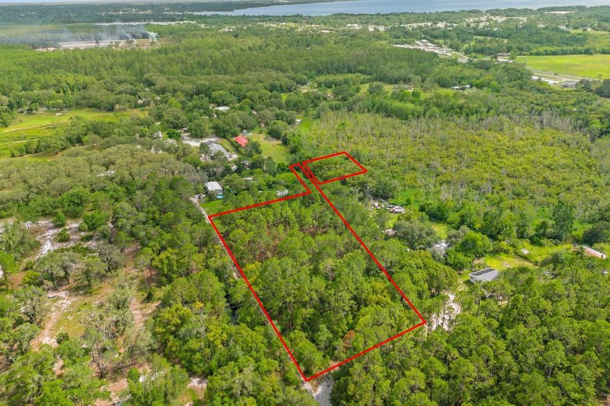 Location, location, location! Build your dream home with no HOA! Zoned R-6. Good opportunity for a builder or land developer to potentially split up into multple lots. Dont miss your your chance to purchase 4 acres of beautiful land in a very desirable area of Lake County! Dream of having the peace and quiet of country living, but want the convenience of nearby shopping and dining? Then this is the one! You wont find a better deal in the area with this much land. Property is located right off of 19, just minutes to both Downtown Eustis and Mount Dora. An easy commute to Orlando, beaches, and all Central Fl attractions. Included in the list price is a 2nd parcel 26-18-26-0004-000-04004 which connects to west corner backside of property. 2 parcels of land for a total of 4 acres. 3 on Tropical and 1 on Penny. Great location!