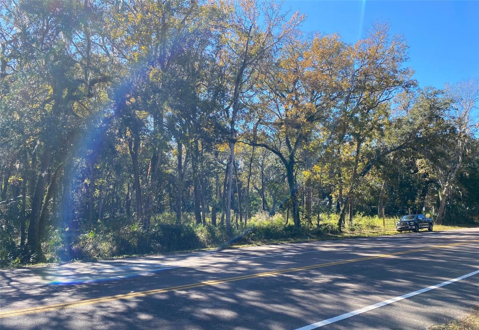4.8 acres on the corner of LAKE LINDSEY RD and HWY 98. Currently zoned AR2 future land use has it being for commercial use and would make a great site for a mechanic shop, storage, lay down yard or industrial. Owner will give time to rezone while under contract.