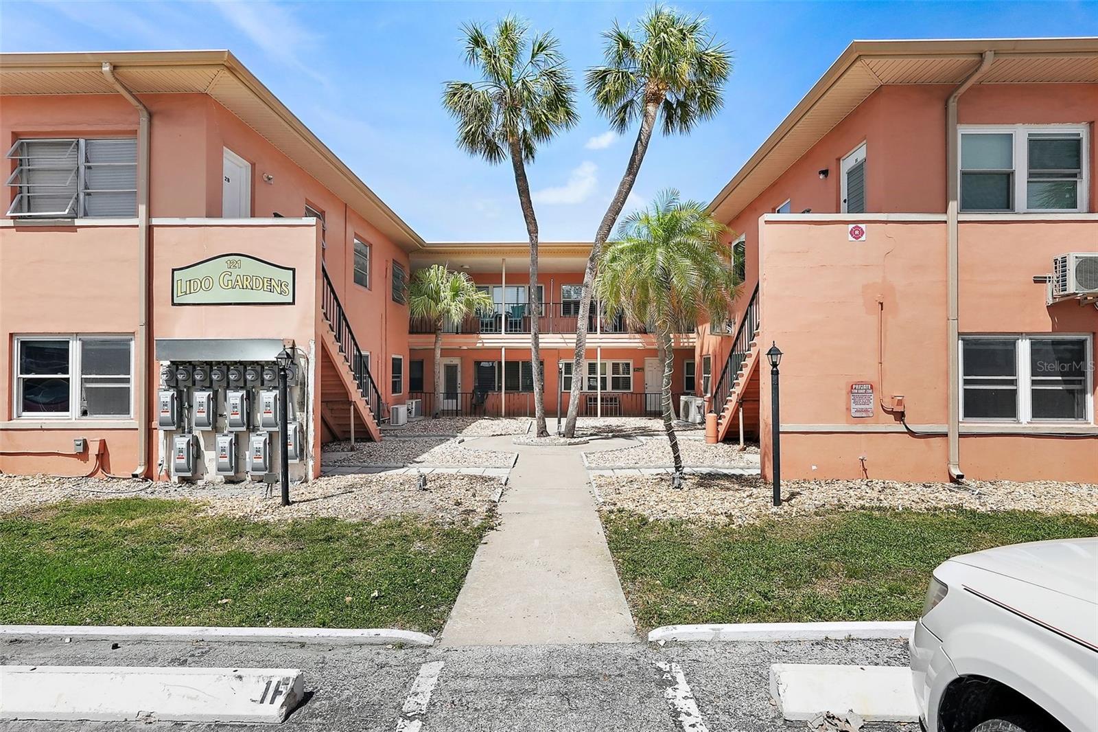 Best unit in the building! 2 bed, 1 bath second floor corner unit with a view of the pool being sold turnkey furnished. Indestructible Terrazzo flooring throughout is cool on bare feet in the Summer with a gentle cross-breeze makes this a perfect beach house for snowbirds or those wanting to live just across Gulf Blvd from one of the finest best beaches in America. Low HOA ($450) includes water, sewer, trash, building and flood insurance. Lease friendly HOA 1-mo. min. lease period up to 6 times/year. Sink your tootsies in the sugar-soft sand and float in the healing waters of the Gulf. Hungry? Chick-fil-A, Publix, CVS and Starbucks are steps outside the back gate at Dolphin Village shopping center. Want to sail away? Book a sunset cruise from Dolphin Landings steps from your new home! See Floor Plan for room dimensions. No pets.