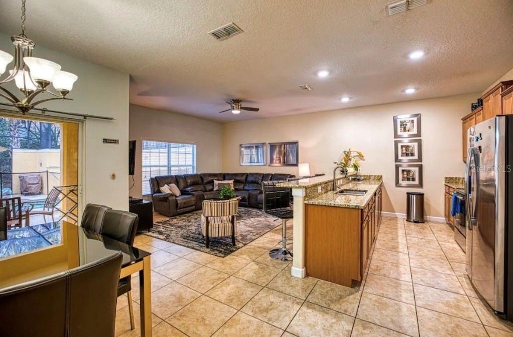 Photo of 2935 Banana Palm Drive, Kissimmee, FL 34747 (MLS # O6438109)