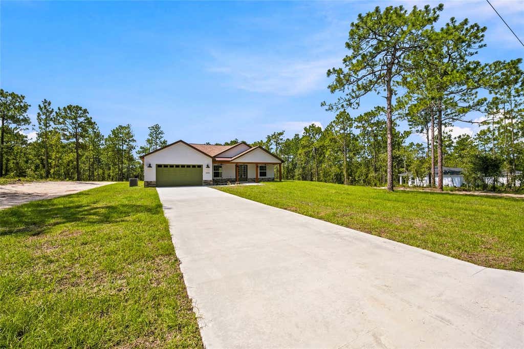 Photo of 12226 SW 96th Lane, Dunnellon, FL 34432 (MLS # OM730417)