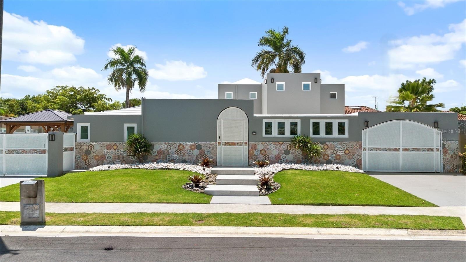 Beautiful property with an approx. 3,200 square feet of living space, a unique feature in a neighborhood where single family homes rarely have more than 2,000 square feet of living space. This stylish home has a two-story floorplan consisting of 4 bedrooms and 3.5 bathrooms. (owner's suite is located the 2nd floor with an impressive walk-in closet and a spa-like ensuite bathroom). Main living area of the home features a dream kitchen and a great room with natural light. Property is fully equipped with a/c units, appliances, ceiling fans, a 500-gallon water cistern, a solar water heater and an owned photovoltaic system with 12 panels and a battery that will provide you comfort and savings on your electric bill. Resort-like backyard with a swimming pool with a heater and pergolas. 600 Square meters of lot size. Security windows and doors. Dorado del Mar neighborhood offers a great location in the heart of Dorado, with security, sport facilities, golf course, entertainment venues, a Co-Ed school (Dorado Academy), an Embassy Suites hotel and access to the beach. For Investors, the HOA ALLOWS SHORT TERM RENTALS provided the buyer registers with the PR Tourism Company and the HOA office.