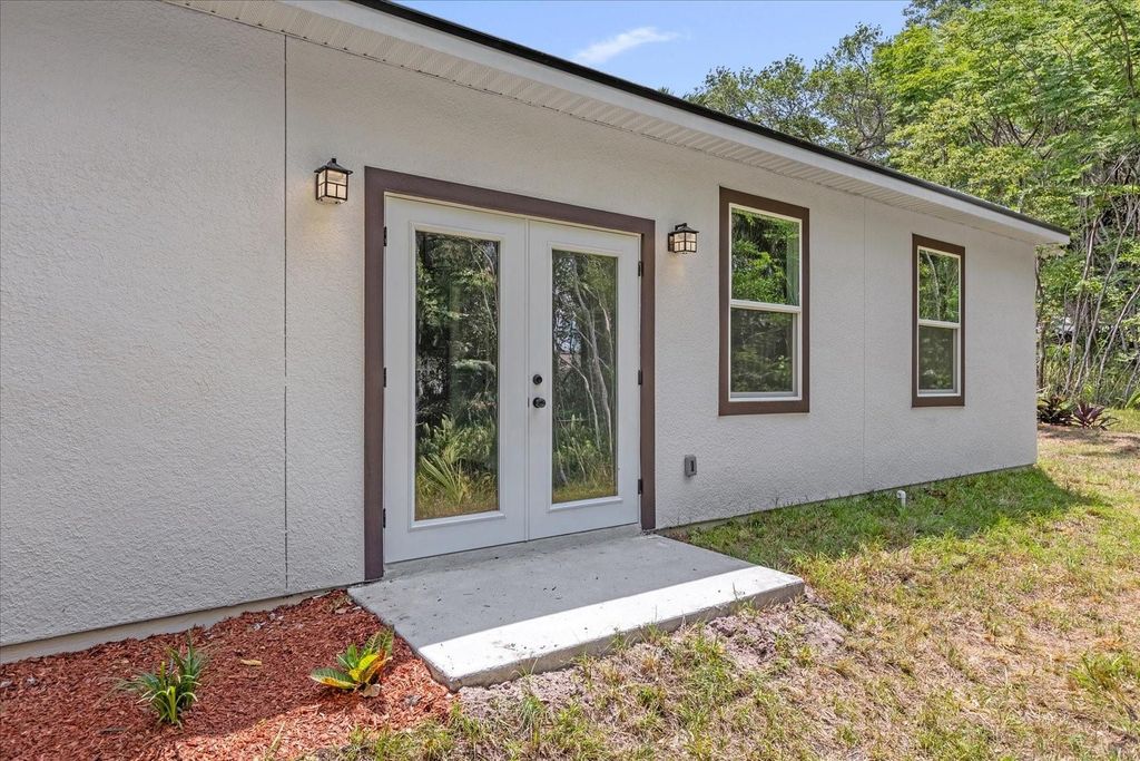 Photo of 1126 S Thompson Avenue, Deland, FL 32720 (MLS # O6406576)