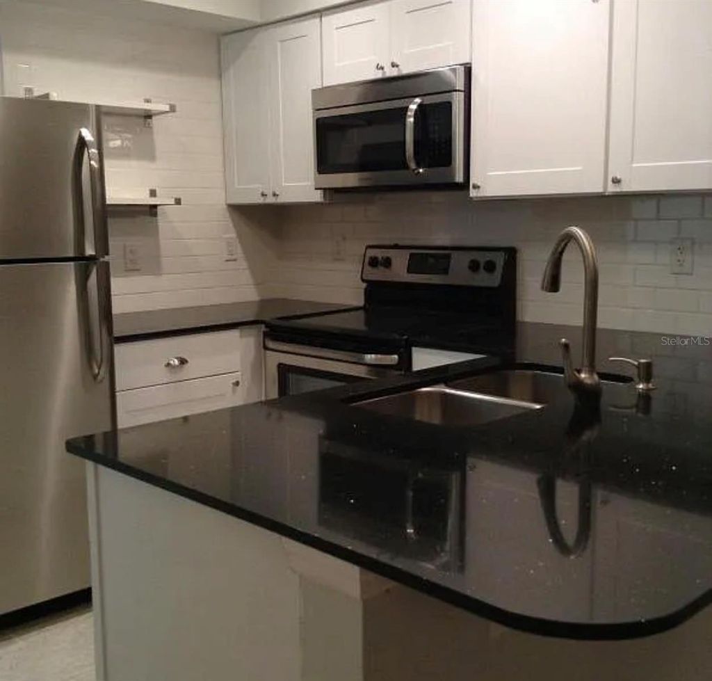 Photo of 3818 River Oaks Court #B, New Port Richey, FL 34655 (MLS # TB8457224)