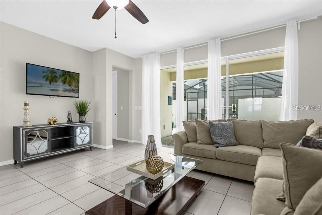 Photo of 1540 Carey Palm Circle, Kissimmee, FL 34747 (MLS # O6409412)
