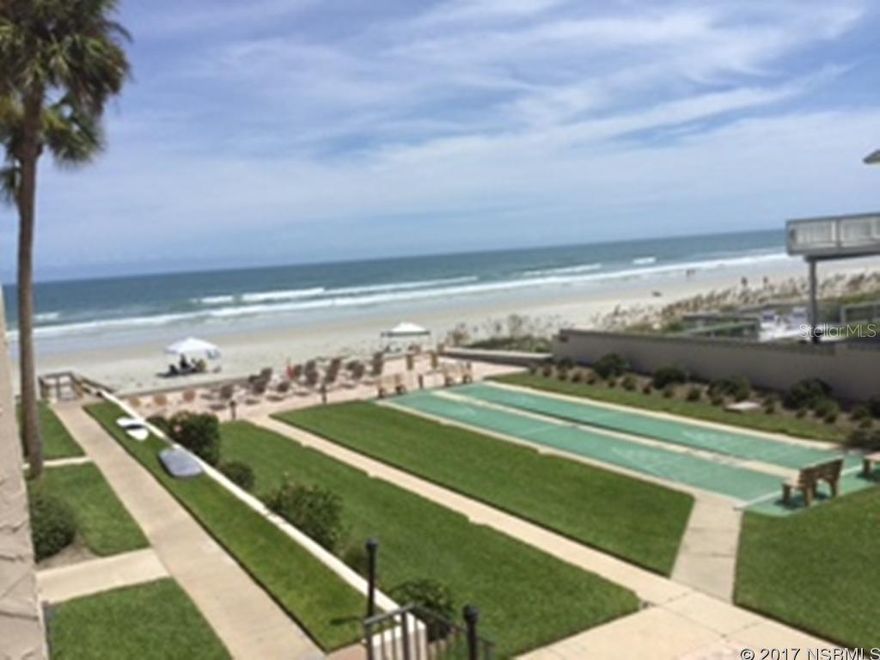 WOW!  This is an asked for condo in the rental pool. Everything in unit is included.  It has to be listed as a one bedroom but the owner had a contractor open the wall to make a second bedroom 10â9x7â9â.  The master has in the living room a sofa that is a queen pull out.  The master has a king and the other room has a queen size trundle bed.  Washer and dryer in the unit.  Beautifully decorated and extraordinarily clean.  Kitchen has been opened also and has an island kitchen.  Perfect location on the second floor.  Two units from oceanfront.  Awesome views of the ocean and the pool.  Complex is one of the closest complexes to the no-drive beach.  Chairs at the seawall (pavers) and pavers around the pool and kiddie pool.  New clubhouse.  Check this one out as it wonât last long!  Both A/C units inside and on the roof installed 4/2014. ;LocationDescription: Condo ;Water: City