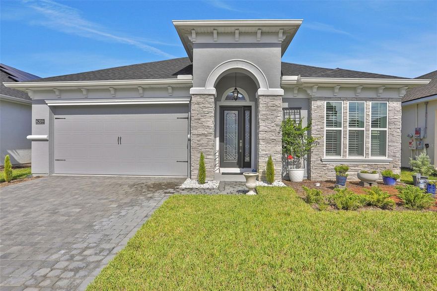 Welcome to your dream home in the charming Woodhaven neighborhood of Port Orange! This stunning craftsman-style elevation with a Serena floorplan, is a true gem offering a perfect blend of modern luxury and comfort. Boasting 4 bedrooms and 3 full bathrooms spread over 2,239 living square feet, this home provides ample space for your family's needs. Step inside and be greeted by the grandeur of 12' ceilings in the common areas, creating an open and airy atmosphere that's both inviting and spacious. The thoughtfully designed layout includes a den, allowing for a private home office or cozy reading nook - the choice is yours. The heart of this home is the exquisitely designed kitchen. The deluxe kitchen features quartz countertops, reverse osmosis water filter, built-in appliances,

and a cooktop, catering to your culinary ambitions.
Retreat to the enclosed lanai - a perfect spot to sip your morning coffee or unwind after a long day, overlooking your expansive backyard that opens up to the tranquil waterfront pond. Plantation shutters grace every window and for your peace of mind, a tamper alarm secures all windows, ensuring your family's safety.
The Woodhaven neighborhood is more than just a place to live - it's a community that embodies the spirit of Port Orange. The top-rated school district adds an extra layer of appeal for families and with neighborhood amenities such as a pool for those sunny Florida days and a security gate at the entrance, you'll experience comfort and peace of mind.
Don't miss the opportunity to experience the lifestyle and elegance this property offers. Schedule a showing today and envision yourself in this exquisite haven in Woodhaven! ;Water: City