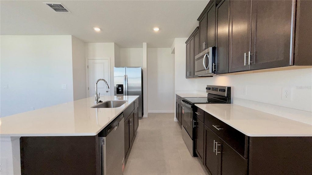 Photo of 5117 Native Mile Loop, Davenport, FL 33837 (MLS # O6440231)