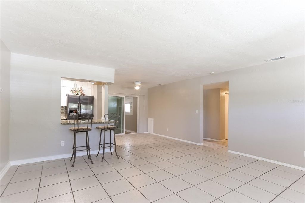 Photo of 3828 Neptune Drive SE, St Petersburg, FL 33705 (MLS # O6369403)