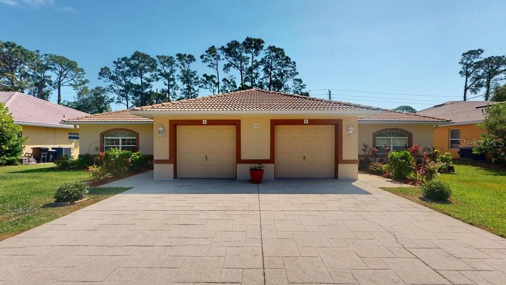 This is your chance to own a beautifully maintained duplex home in the highly sought after Palm Harbor neighborhood of Palm Coast. Each side features 3 Bedrooms, 2 Baths and a large screened in porch overlooking a private back yard. This home offers the perfect setup for living on one side and generating rental income from the other or excellent investment potential with no restrictions.
Amaral quality built block home, which boasts 3 Bedrooms, 2 Baths on each side, freshly painted inside and out with large screened in Lanai on both sides with private views and mature landscaping!
Tile roof and new A/C units on both sides