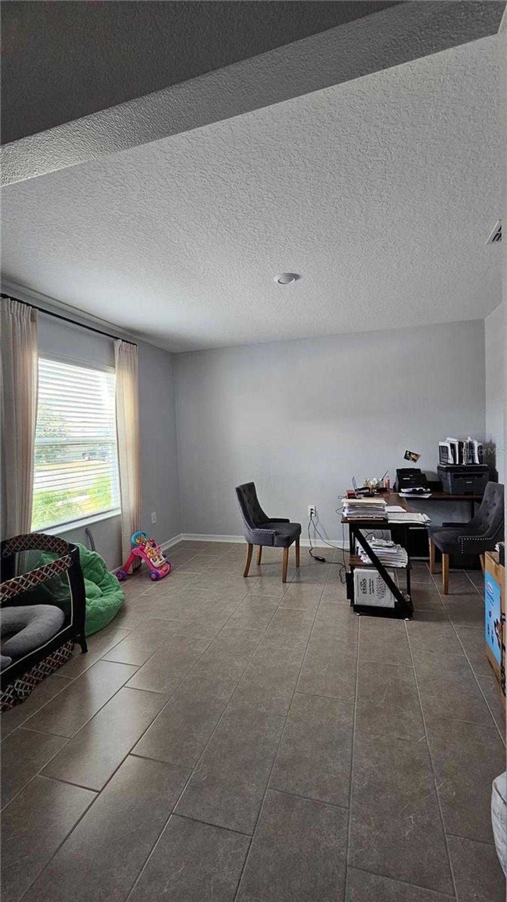 Photo of 600 Silver Palm Drive, Haines City, FL 33844 (MLS # S5141720)