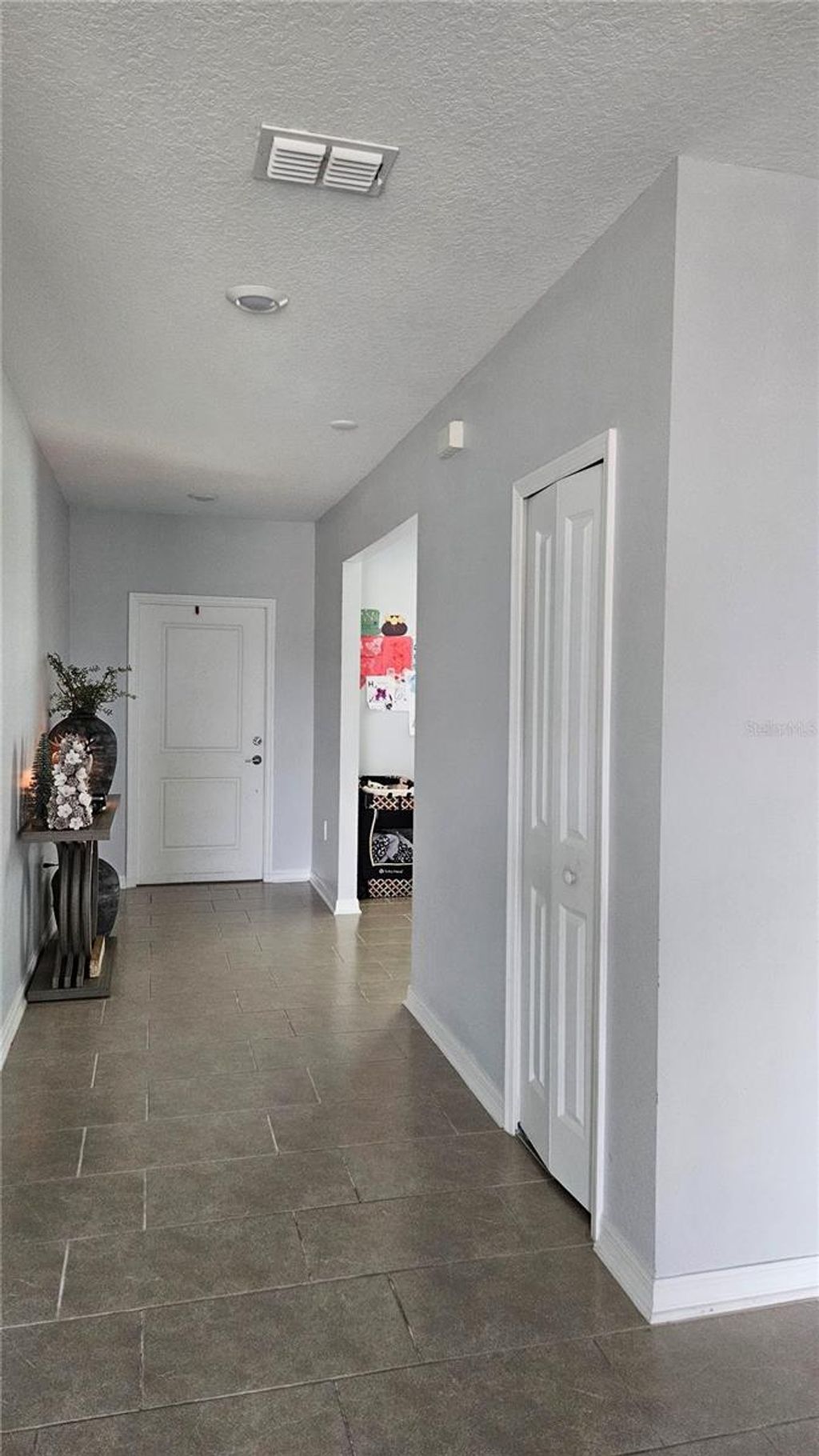 Photo of 600 Silver Palm Drive, Haines City, FL 33844 (MLS # S5141720)