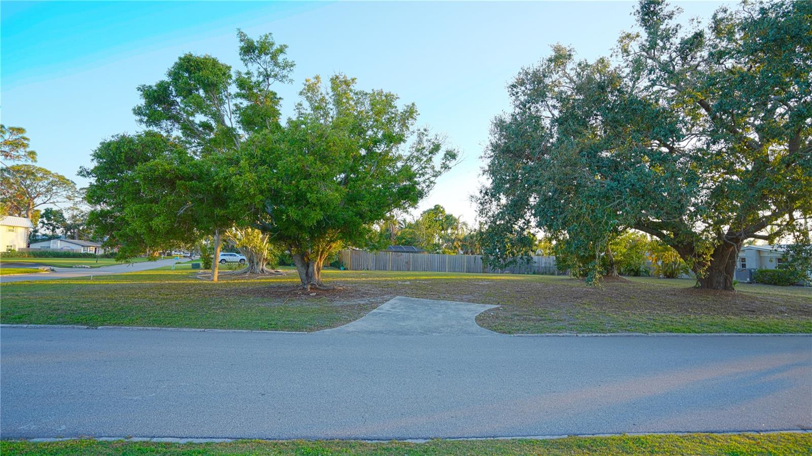Ready for your plans to bring to life this oversized corner lot sits within one of Sarasota’s most sought-after West of Trail locations. Less than 2 miles from the world-renowned Siesta Key Beach, offering unparalleled, convenient, access to sun, sand, and surf. This residential community has the perfect mix of single-family homes, condominiums, and villas. Inclusive of many waterfront properties ranging from well preserved Florida ranch style, mid-century, and current trend of modern luxury. Sarasota County allows for flexibility with a secondary structure (refer to County Building & Zoning). Corner lot provides even more options for making the most of the space available. With its prime location just minutes from downtown Sarasota’s vibrant cultural scene, dining, shopping, and entertainment, you can enjoy the best of both worlds – a serene coastal retreat with the excitement of city living close by. All of this exists while remaining outside of the Flood Zone and will thrive with current hurricane building codes and standards. The property previously had an existing home, so the infrastructure is already in place. Certainly, an opportunity not to miss.