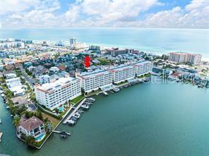 Highly sought-after Redington Shores Yacht and Tennis Club in beautiful Redington Shores, FL. At 1995 Sq ft with 3 bedrooms, 3 full baths and open floor plan, there is plenty of room for living, vacationing and even renting- allowing for 1 month rentals. The huge balcony overlooking the breathtaking waters of the intracoastal waterway is perfect to relax and watch the dolphins play, the boat parades and our glorious sunrises and sunsets! NOTHING beats our Florida sky- it is majestic! Each bedroom has it's own bathroom and walk in closet- tons of storage and space. The living space is open concept with beautiful water views, and the kitchen is well equipped with a center island and a desk nook. There is a laundry room that is perfect and convenient for your cleaning supplies and has a BRAND NEW air conditioning unit. This Property offers an unbeatable location across the street from the white sands and crystal blue water of Redington Beach with it's own private entrance, and the community boasts a variety of top-notch amenities, including tennis courts, pool, and club house, kayak launch, heated pool and fitness center. Enjoy peace of mind whether a full time residents or seasonal offered by a gated community and 24 hour guard! Redington Shores Yacht and Tennis is a unique setup on the beach as it is not only gated but it is a perfect mixture of Luxury homes and Condominiums situated along the intracoastal and across the street from the beach. Unit #204 even comes with a coveted pool side cabana perfect for bikes, kayaks, pool toys/chairs. This unit is pet friendly allowing for 2 small animals and comes fully furnished and is ready to go!