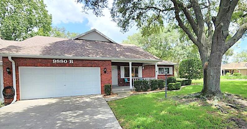 This Bostonian Model is a FULLY REMODELED END UNIT w/2024 ROOF and NO CARPET. Your Next Home is QUIETLY SITUATED Off the Beaten Path on a CORNER LOT that is SURROUNDED BY GREENSPACE and elevated above neighboring villas for extra privacy. Enchanting Traditional Red Brick Façade, Stately Shade Tree, and an Inviting Front Porch with Wite Picket Fence welcomes Your Family and Friends! ALL WINDOWS WERE REPLACED for extra energy savings. Your Living and Dining areas are a Combined Space. And, your Kitchen, Family, and Breakfast Nook are another Combined Space. The seller lovingly calls Your Enclosed Florida Room his BONUS SUNROOM, as it is under AC and Heat and has 3 huge picture windows with reflective UV film for Energy Savings and Privacy. You’ll enjoy spending time out on your COVERED BACK PAVER PATIO with partial privacy wall on the street side and a darling Wite Picket Fence and Hedges for more privacy and beauty! So many Details…. You Need to Ask for Your Copy of the FEATURES LIST to see ALL THAT IS INCLUDED in the sale! The World Renowned OTOW AMENITIES are beautifully presented at the OTOW website. See Community Information Paragraph for the web address.