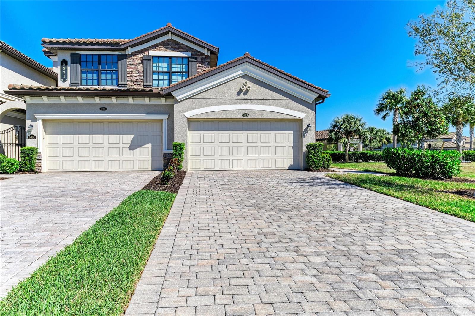 Play golf where you live in this Stunning, Pristine 3-bedroom, 2-bath Coach Home located in Lakewood National. This sought-after first-floor end unit has barely been lived in, offering a fresh and inviting atmosphere. The gourmet kitchen features NEW Quartz countertops, a gorgeous matching backsplash, and elegant white cabinets, complemented by an extended island that’s perfect for entertaining. Beautiful tile flooring throughout ensures easy cleaning and a modern aesthetic. The primary bedroom boasts a luxurious bathroom and 2 large walk-in closets, providing ample storage and comfort. The living room slider is a remote controlled shade for Privacy and the Lanai has a Sun shade. Step outside to the extended lanai, where you can enjoy tranquil preserve views, making it an ideal spot for relaxation and unwinding. This meticulously cared-for home is fabulous for entertaining, allowing you to host gatherings with ease. Lakewood National offers an impressive array of amenities, including two 18-hole Arnold Palmer golf courses, tennis courts, pickleball, a tiki bar restaurant, a spa with zero-entry pools, a state-of-the-art gym, and a full-time activities director to keep residents engaged and active. Don’t miss out on the chance to make wonderful friends and enjoy the vibrant lifestyle in this fabulous community. Located just minutes from Waterside and a short thirty-minute drive to the world’s most beautiful beaches, this condo is the perfect place to call home. Experience the best of Florida living in Lakewood National! This condo has a 30 day minimum rental. Great for investors or a second home .
