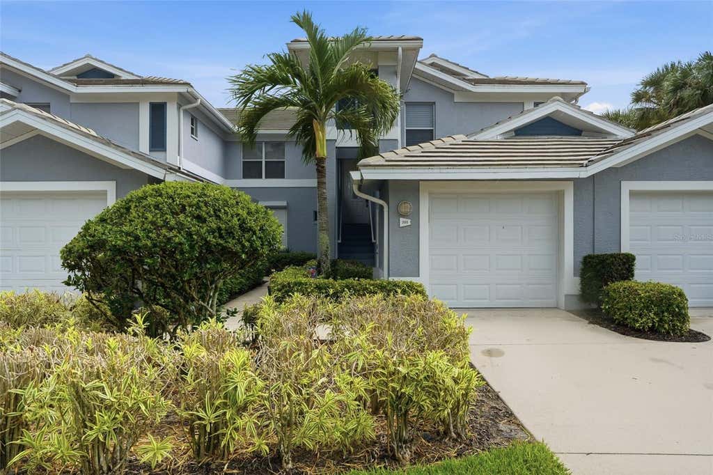 Photo of 710 Tarpon Cove Drive #203, Naples, FL 34110 (MLS # C7529412)