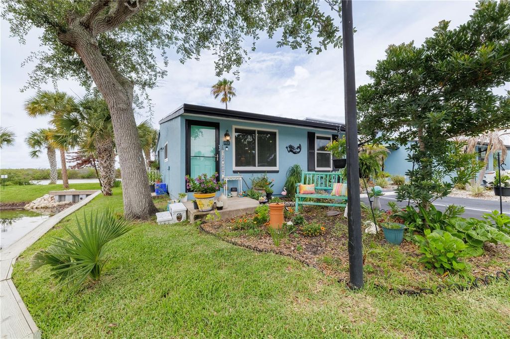 Photo of 100 Poinciana Cove Court #100, New Smyrna Beach, FL 32169 (MLS # O6416012)