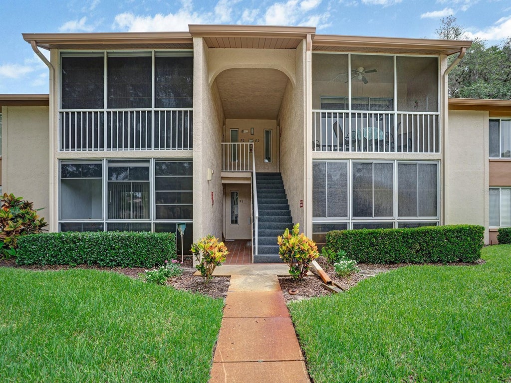 Photo of 13122 Slash Pine Drive #E2, Hudson, FL 34669 (MLS # TB8553869)