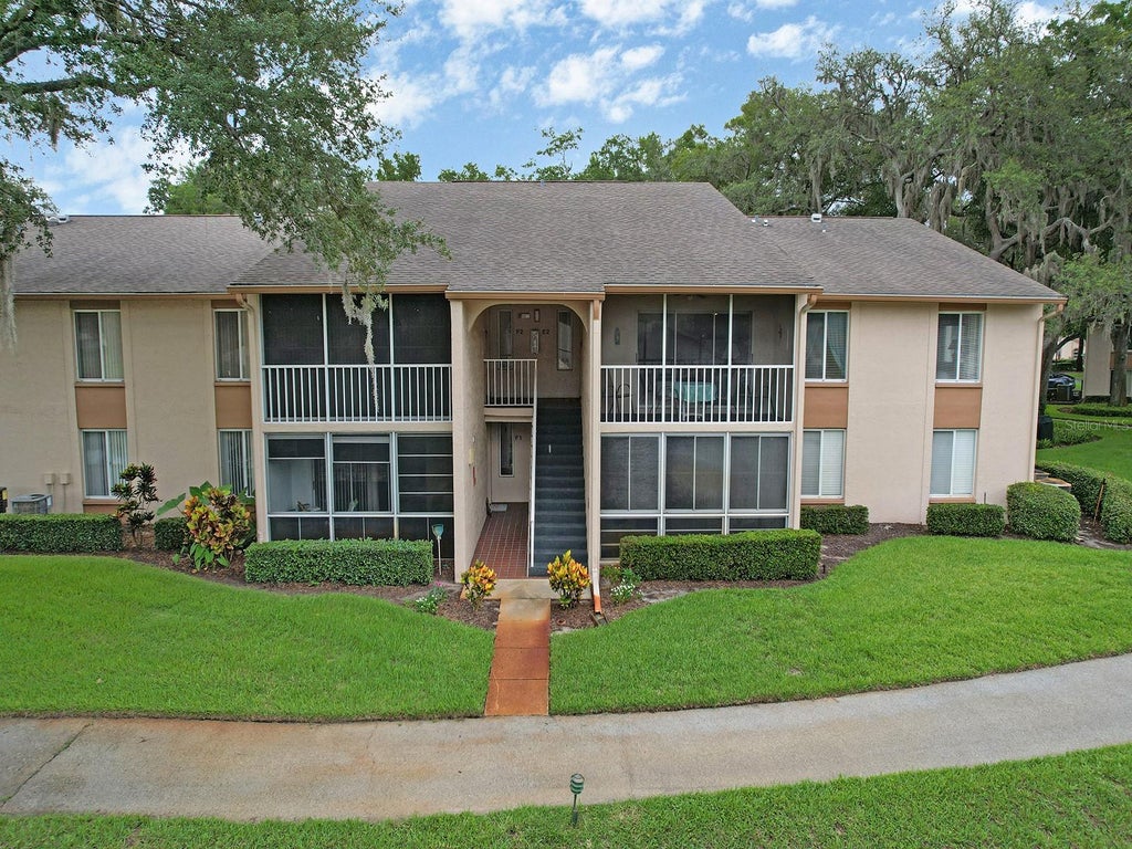 Photo of 13122 Slash Pine Drive #E2, Hudson, FL 34669 (MLS # TB8553869)