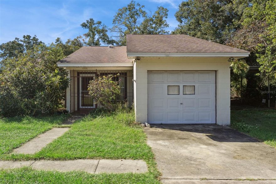 Great investment opportunity near Baldwin Park! No HOA, great fixer-upper on 0.35-acre corner lot off Old Cheney/Coletta Dr in downtown Orlando! Conveniently located near SR-50, SR-436, and the 417, you are only a short drive to shops and dining at Baldwin Park, UCF, downtown Orlando, the airport, and Altamonte Springs. This one-story home has great bones, with solid concrete block construction, hardiboard plank siding, three bedrooms, two full bathrooms, an open kitchen to the great room with a wood-burning fireplace, a den, and another bonus room. The roof is only eight years old, the house has been replumbed, the home is on public water and sewer, and the dishwasher is only one year old. The large, fenced-in corner lot is perfect for parking oversized trucks and RVs. This yard is ideal for dog lovers with multiple dogs. No HOA and a fenced 1/3 acre lot. There is an attached one-car garage and a four-car carport, perfect for your workshop or storage. This home needs a total refresh inside and new appliances, but the structure, functional layout, location, no septic or well, no HOA, and oversized lot make this a GREAT home or investment.