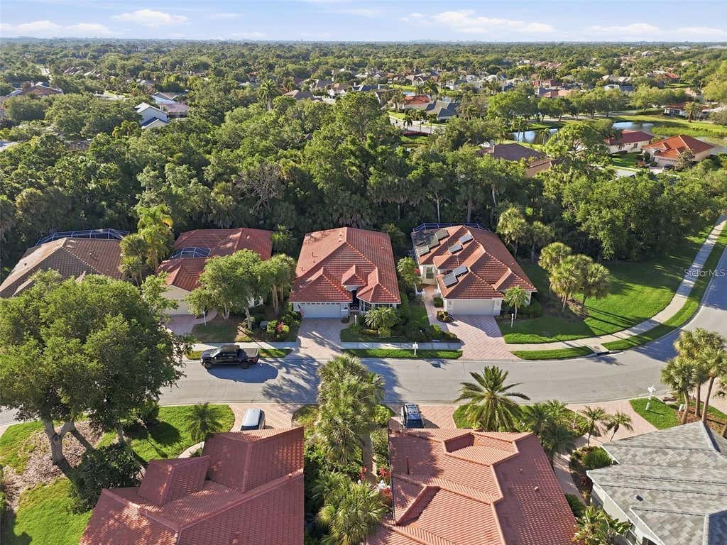 Photo of 5127 Hanging Moss Lane, Sarasota, FL 34238 (MLS # OM730682)