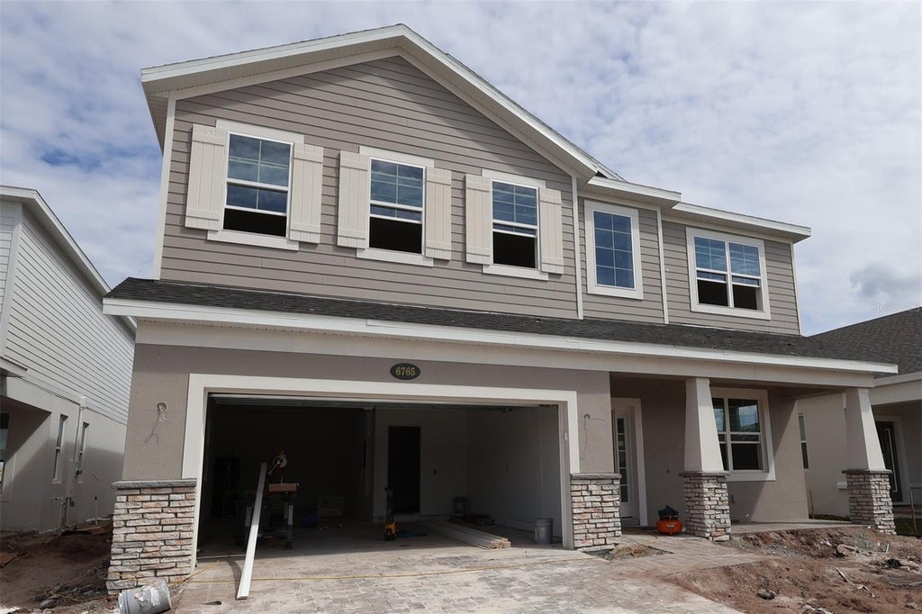 Photo of 6765 Yellow Warbler Bend, Saint Cloud, FL 34773 (MLS # O6450480)